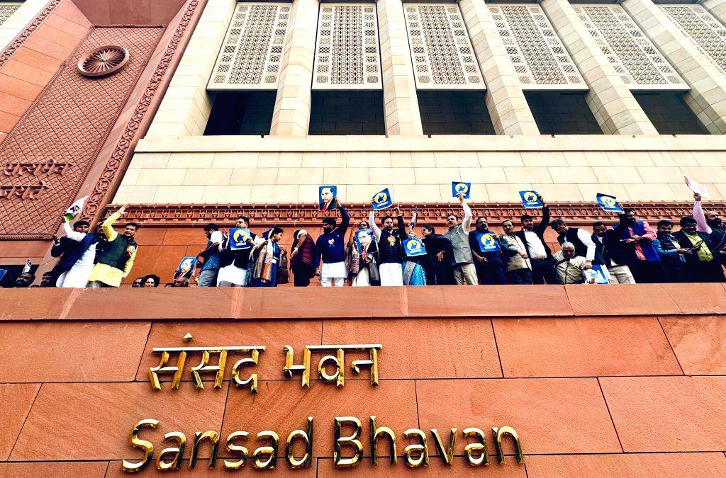 MPs of INDIA bloc climb the walls of Makar Dwar at the Parliament and ...